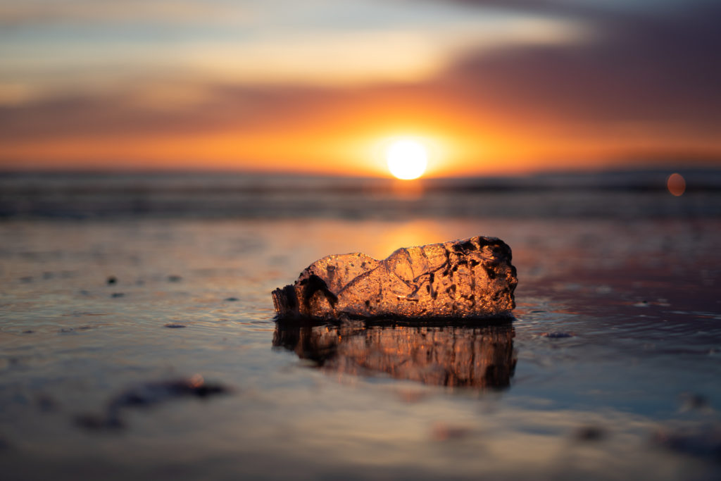 Water bottle on the beach