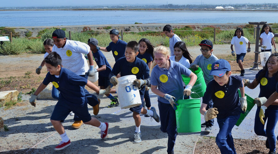 Ocean Connectors students running towards project